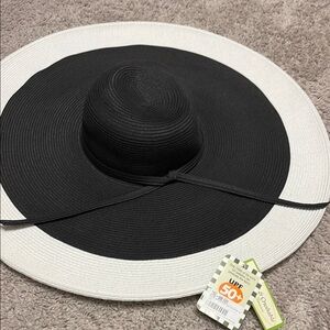 Wide-Brimmed Black and White Hat for Sun Protection